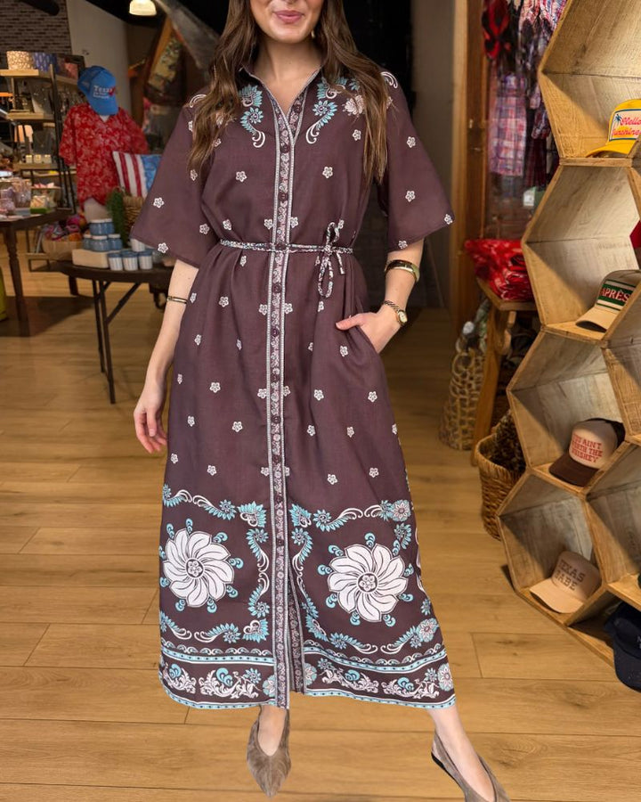 Chocolate brown floral border print belted maxi dress front view