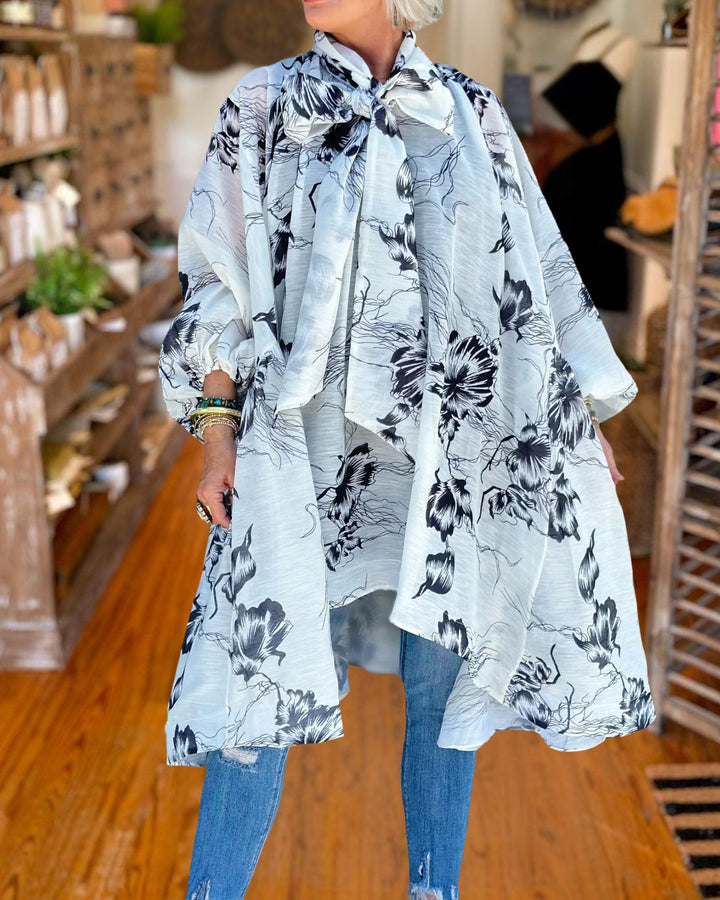 Elegant Floral Tie Neck Cape Dress front view